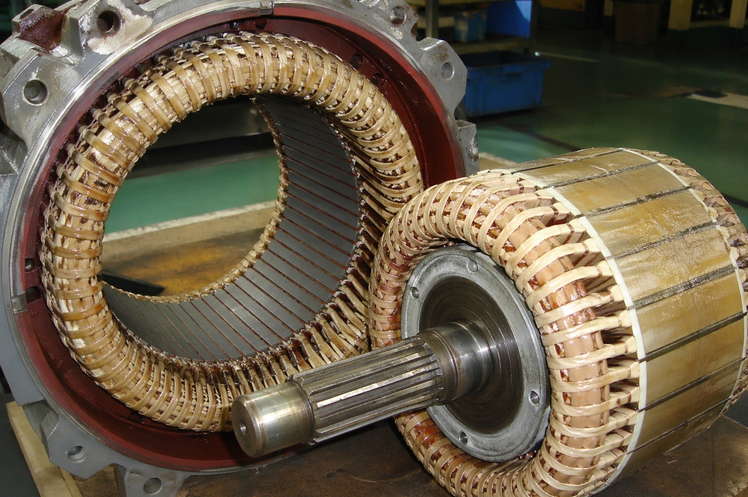 Mica insulation in railway traction motor - muscovite tape winding protection and phlogopite paper thermal barrier for 3000V continuous operation at 200°C